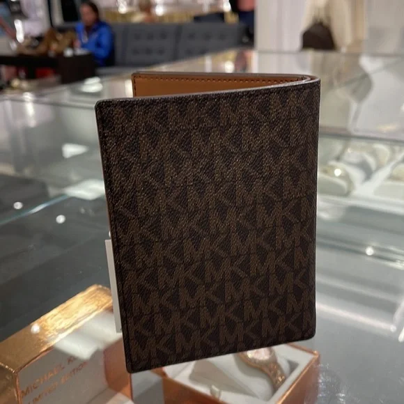 Michael Kors Jet Set Travel Passport Wallet
Brown Signature/Golden-Tone Hardware - Picture 10 of 16